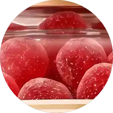 Close view of the red berry Gelagen gummies inside the bottle